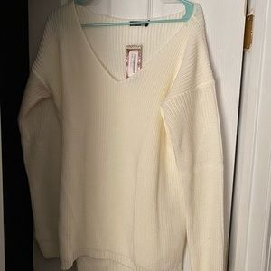Tall women’s cream and black sweater